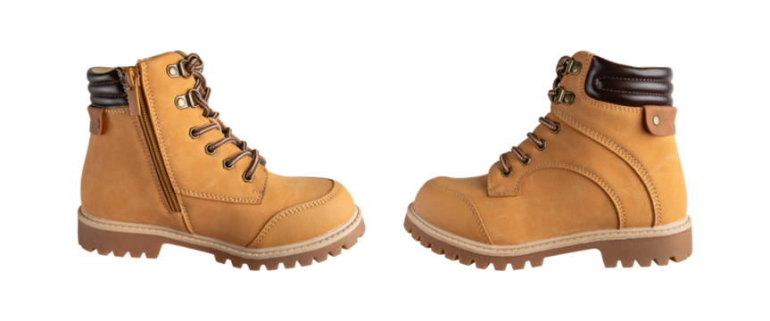 Cut-out autumn leather boots. Brown men's boots made of genuine nubuck with a rough sole isolated on white background. With clipping path. Fashionable winter hiking trekking shoes, work boots, mockup