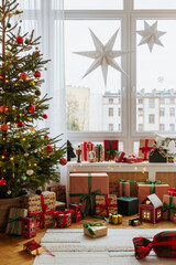 Cozy living room with Christmas decorations, glowing star lights, and festive pillows. Warm holiday...