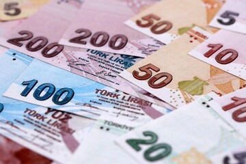 Obraz premium Turkish Liras currency money bills. TRY currency banknotes in stack with different denomination close up