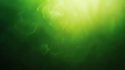 Abstract green background with light shining through, creating a dreamy effect