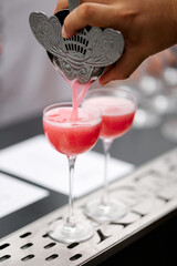 Aesthetically pleasing cocktail preparation at the bar