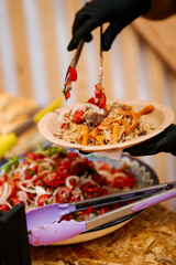 Chef puts street food on a plate