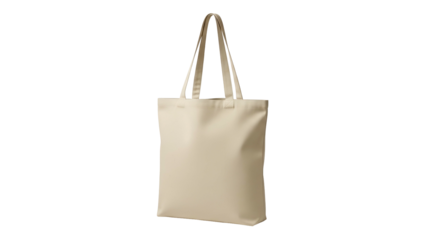 Plain light colored fabric shopping carrier hangs vertically against a dark background