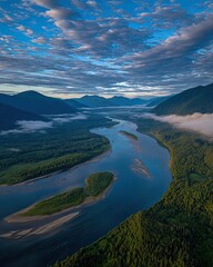 Aerial View Of Winding River Through Lush Green Valley