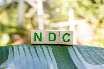 NDC Nationally Determined Contributions Nationally determined contributions are commitments each country makes to reduce greenhouse gas emissions as part of mitigating climate change.