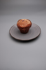 white muffin served on a plate 