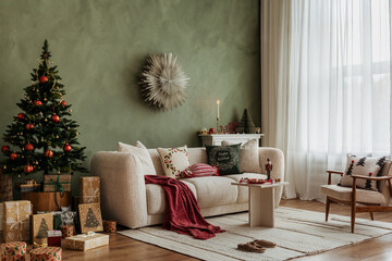Elegant holiday interior with a Christmas tree, neutral sofa, and green accent wall. Warm lighting creates a calm festive mood.