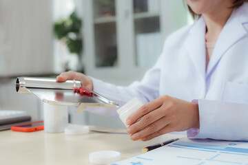 A female doctor examines a patient and explains her diagnosis to him via social media.