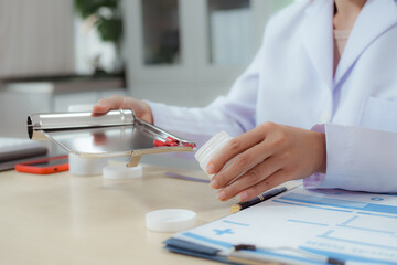 A female doctor examines a patient and explains her diagnosis to him via social media.