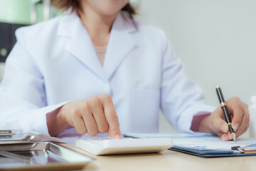 A female doctor examines a patient and explains her diagnosis to him via social media.