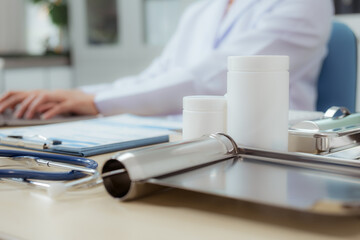 A female doctor examines a patient and explains her diagnosis to him via social media.