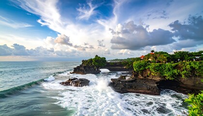 Scenic coastal landscape under a dynamic cloudy sky, waves crashing against dramatic rock formations. Lush greenery thrives atop cliffs