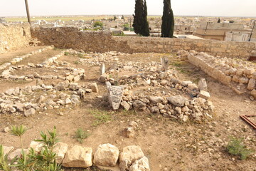Aleppo, Syria. Ancient graves on Marj Dabiq hill. Archaeological site reflects historical heritage and cultural significance, ideal for topics on history, archaeology, ancient civilizations.