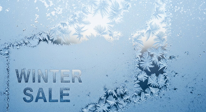 Frost pattern on glass with "Winter Sale" text. The image presents ice crystals, symbolizing winter, cold, and deals, ideal for seasonal promotions
