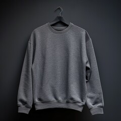 Minimalist gray sweatshirt hanging on invisible hanger with clean light background, soft cotton texture, front view
