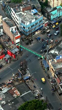 Extreme 4K Top-Down Drone View of Chaotic Indian City Traffic Overpass and Intersection.