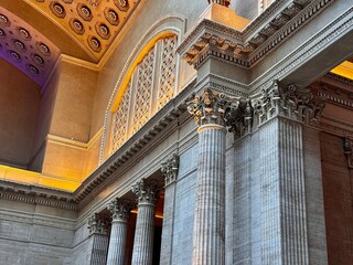Grand Hall Interior with Corinthian Columns and Ornate Ceiling, Warm Architectural Lighting and Classical Marble Detailing