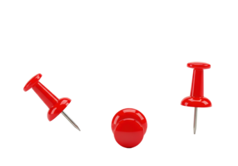 Three identical bright red pushpins, one angled, one upright, one from above, on a pristine transparent surface with copy space, clean studio photo, concept of organization and focus