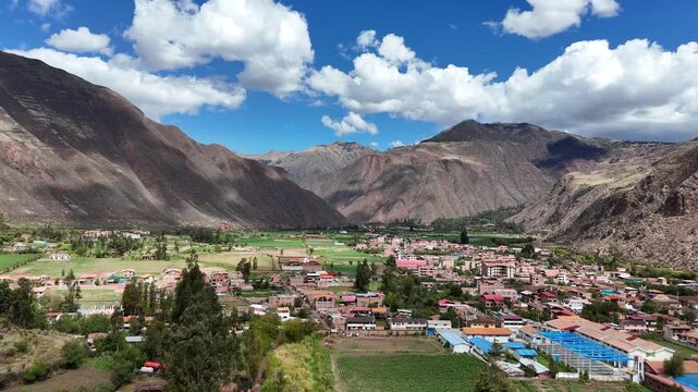 Aerial footage of the historic town of Yucay in Peru's Sacred Valley, a vibrant center of Inca history and Andean life
