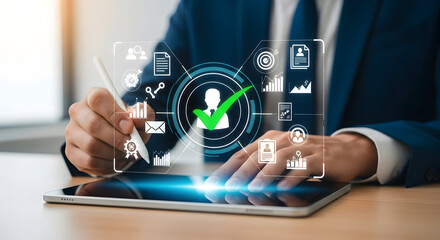 Businessman performing digital candidate selection and validation on a tablet, showcasing modern human resources management, successful recruitment, and approval processes
