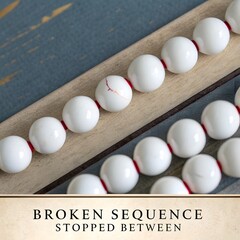 White Marble Balls in a Diagonal Line with a Gap in between