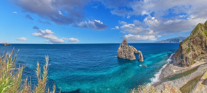 Dramatic cliffs and ocean waves at Madeira coast
