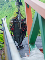 Zipline Cables Suspended Above Green Forest Canopy
