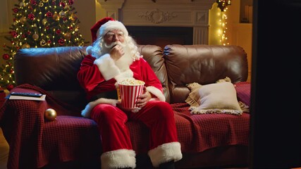 A serene image depicts a person in festive Christmas attire relaxing on a brown leather sofa within a cozy living room setting tranquil scene of leisure