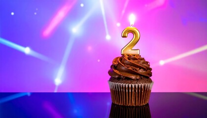 A sweet chocolate cupcake with a lit '2' candle, set against a backdrop of blurred neon lights and bokeh effects