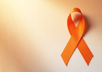 Orange ribbon of awareness, symbolizing support for multiple sclerosis and leukemia awareness campaigns and events
