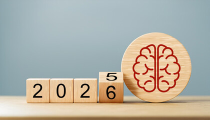 Red Brain Icon on Wooden Round Block with 2025 Changing to 2026 Cubes