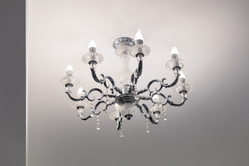 Elegant Crystal Chandelier Illuminating Minimalist Ceiling