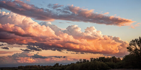 Golden sunset cloudscape dramatic cumulus warm light sky time lapse style evening horizon colorful clouds tranquil mood nature landscape soft glow open field