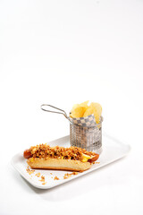 Hot dog with crispy fried onions and potato chips