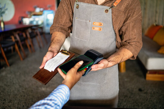 Smart restaurant technology and digital transformation making fast secure cashless transactions easy