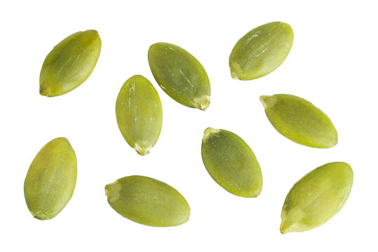 Peeled pumpkin seeds isolated on white background. Top view. Flat lay