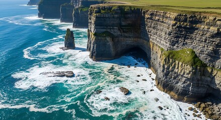 Dramatic aerial view of the majestic Cliffs of Moher in Ireland, with powerful ocean waves crashing against the rugged coastline and a prominent sea stack.