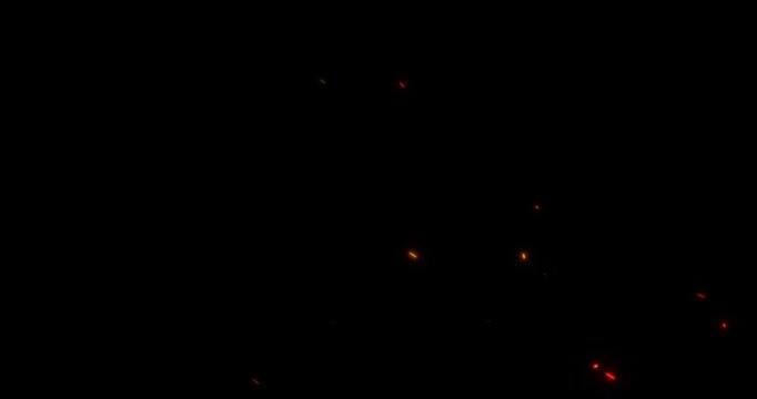 fire sparks from campfire with ash rise over black background, danger explosion