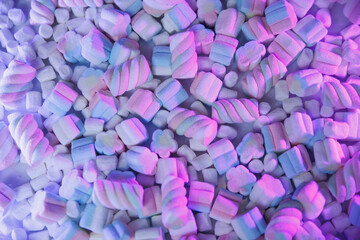 Pink and white marshmallows in neat rows with soft pastel lighting. Sweet candy background for desserts, holidays, parties, birthdays, Valentine’s Day, and bakery designs.