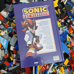 Naklejka premium Sonic the Hedgehog comic book with Shadow on a colorful background