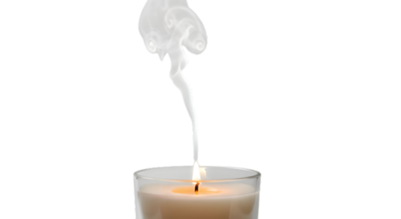 Extinguished candle with smoke isolated on transparent background, symbolizing the end of a moment or memory