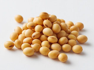Soybeans piled on a clean surface showing their smooth texture and natural color
