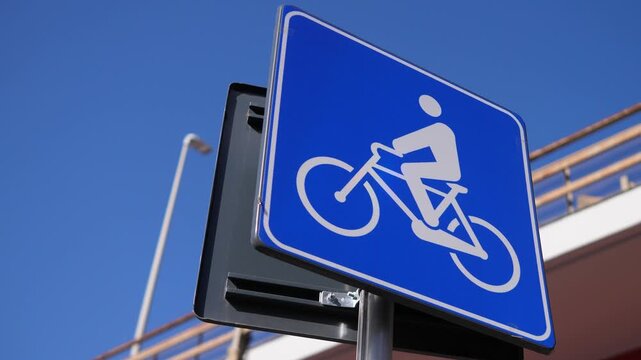 Bike path sign with Rome&rsquo;s Tangenziale Est overhead