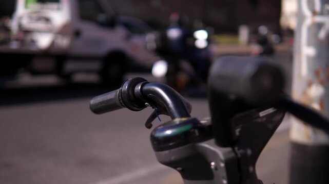 Electric bike parked with Pigneto neighborhood in background
