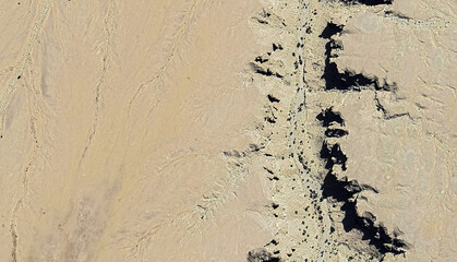 Golden Expanse: Aerial View of Pristine Desert Landscapes Near Yanbu al Bahr, Saudi Arabia