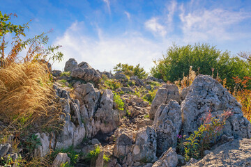 Beautiful autumn  landscape. Montenegro. Narrow path for hiking in mountains above Kotor Bay