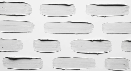 Obraz premium Abstract monochrome texture featuring numerous horizontal white paint strokes with rough edges, creating a minimalist and artistic background for creative projects and design concepts