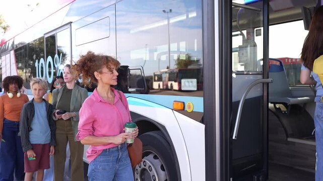 Diverse crowd of passengers lining up and getting on a modern electric bus at a city stop. Public transport promoting sustainable mobility