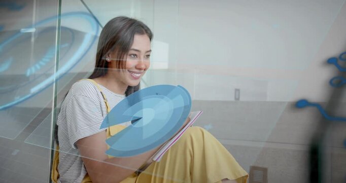 Woman writing pink notebook pen touching overlaying blue chart rotating revealing wedge education
