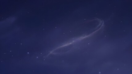 Fototapeta premium A mesmerizing view of a faint celestial ribbon gracefully winding through the deep blue expanse of the night sky, adorned with a scattering of distant stars